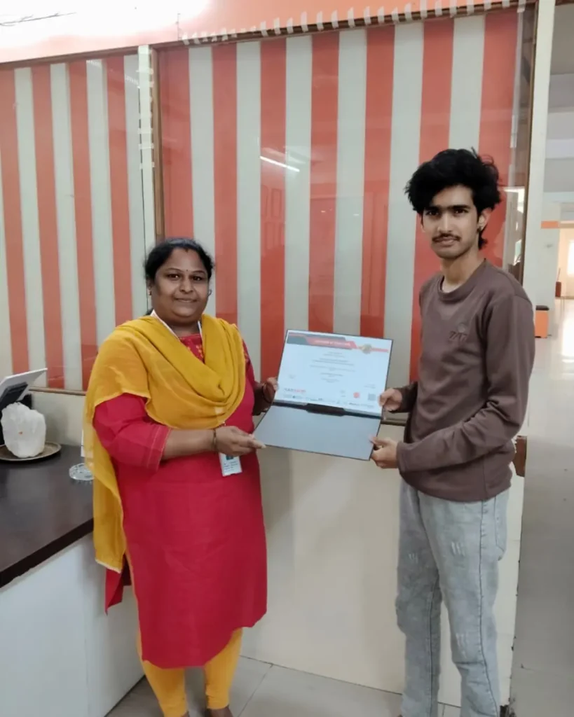 Student Receiving Certification from CAD Center Hyderabad